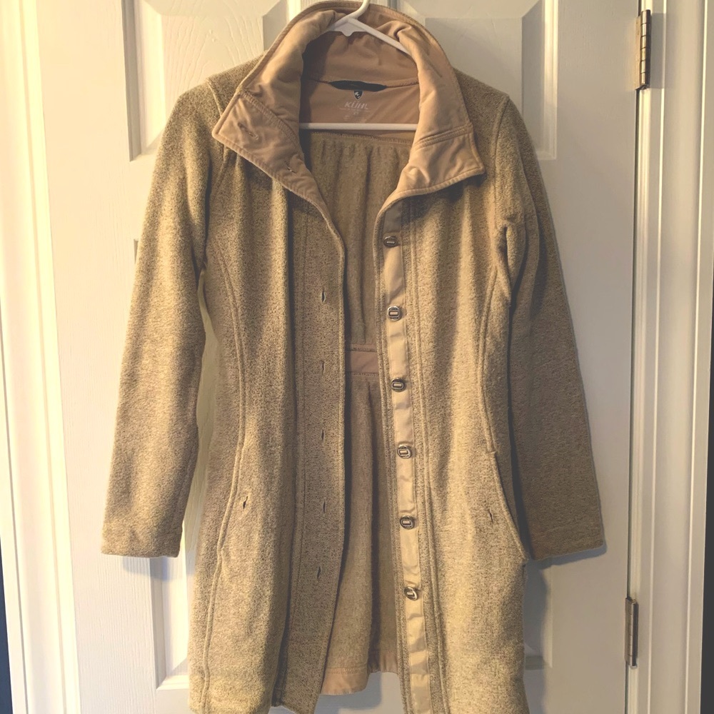 Kuhl brand coat. Lightweight but warm. Button closure